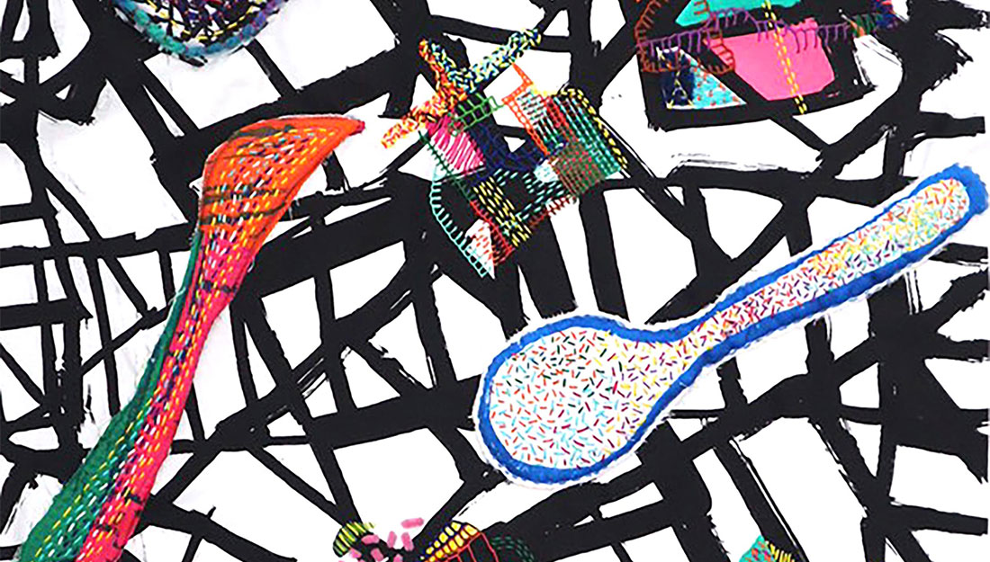 colourful fabric shapes stitched on a graphic background